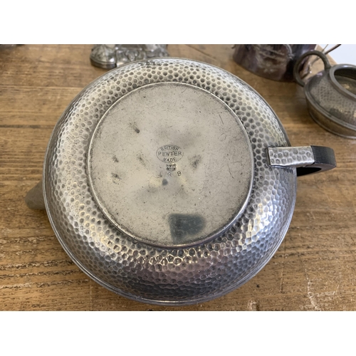 302 - A 'British made' pewter teapot, milk, sugar and plate plus a silver plated candelabra etc