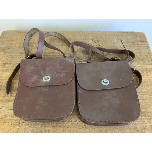 31 - Two vintage leather cash satchels