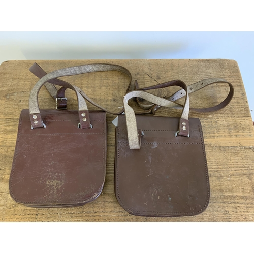 31 - Two vintage leather cash satchels