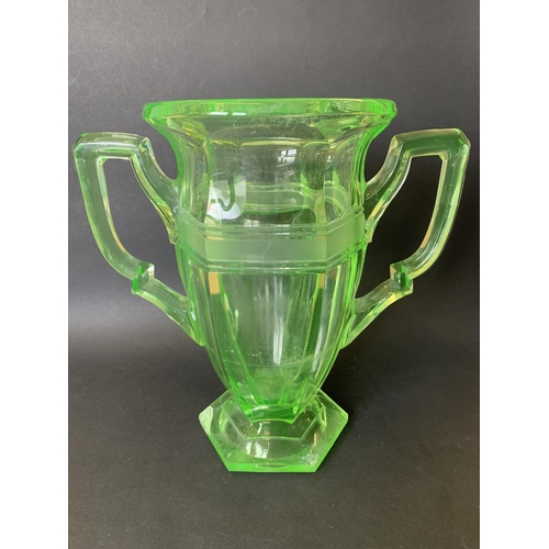 312 - An Art Deco era large moulded uranium two handled glass vase, 10 1/2