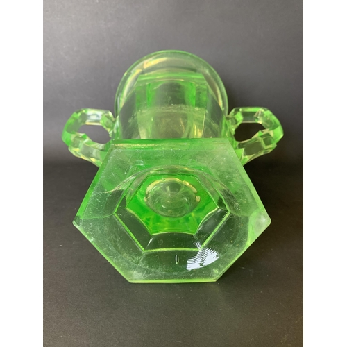 312 - An Art Deco era large moulded uranium two handled glass vase, 10 1/2