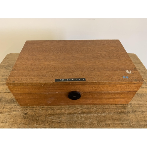 A vintage wood cased Philip Harris Ltd of Birmingham resistance box