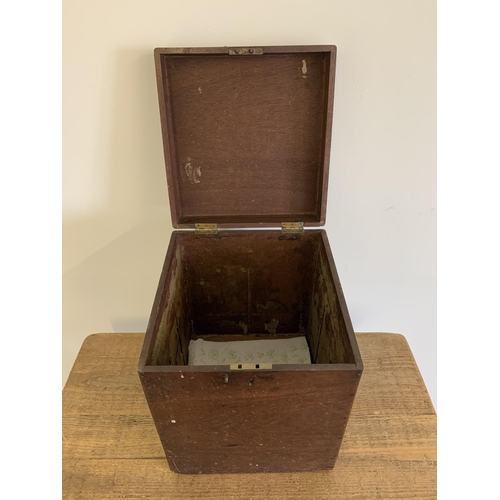 33 - An antique mahogany lidded box with two brass carry handles, 13