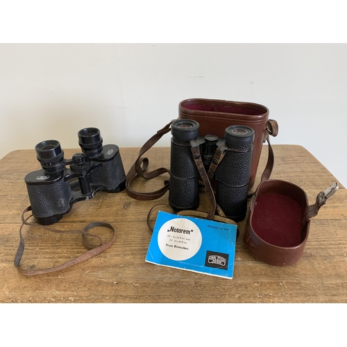 332 - A vintage cased pair of Carl Zeiss Jena Trinovid 8x32b binoculars with very good optics (case as fou... 