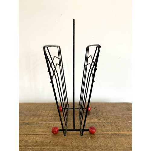 51 - A vintage magazine/paper rack, 16