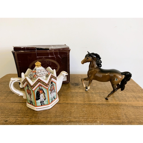 55 - A boxed Sadler Battle of Waterloo teapot plus a Beswick horse