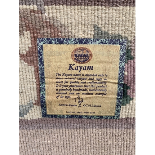 63 - A Kayam Oriental floor rug, 82