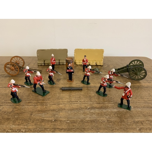 82 - A small selection of vintage hand painted military figures and accessories from a diorama (playworn)