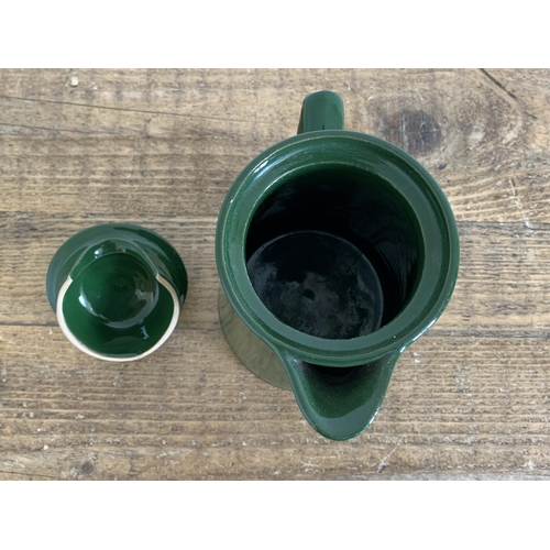 93 - A military Denby enamel coffee pot with a broad arrow on the lid