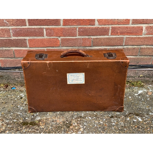 362 - A vintage leather style suitcase