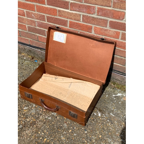 362 - A vintage leather style suitcase