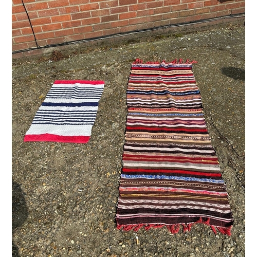 366 - A vintage multi coloured striped floor runner, 72