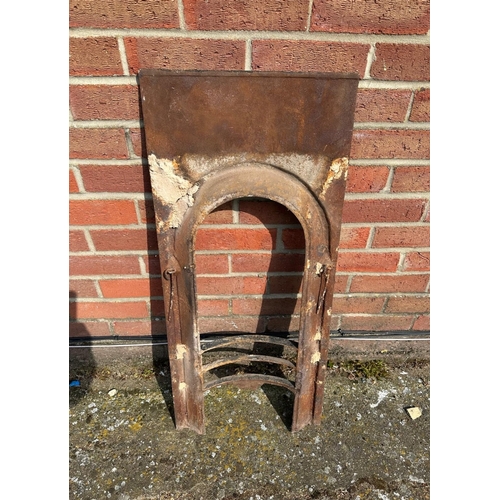 371 - An antique cast iron nursery size fire place, height 35 1/2