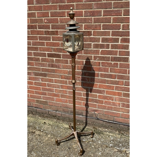 358 - An unusual vintage copper based standard lamp with carriage lamp style top, adjustable column and fo... 