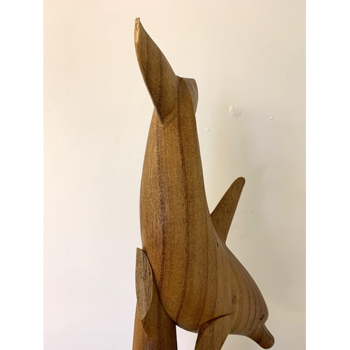 47 - A very large carved wood figure group of two dolphins, approx. 39