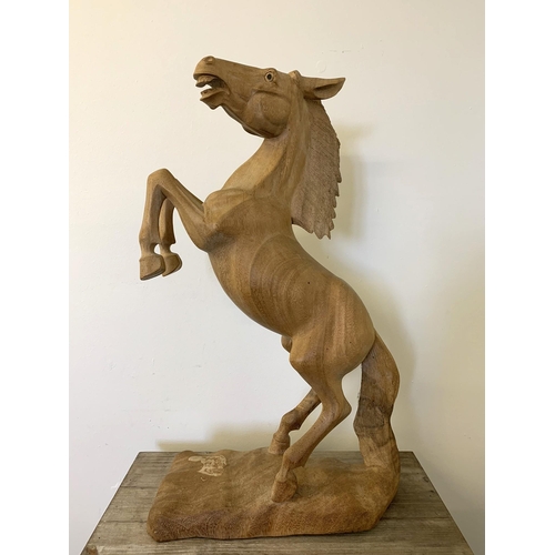 48 - A carved wood figure of a rearing horse, approx. 24