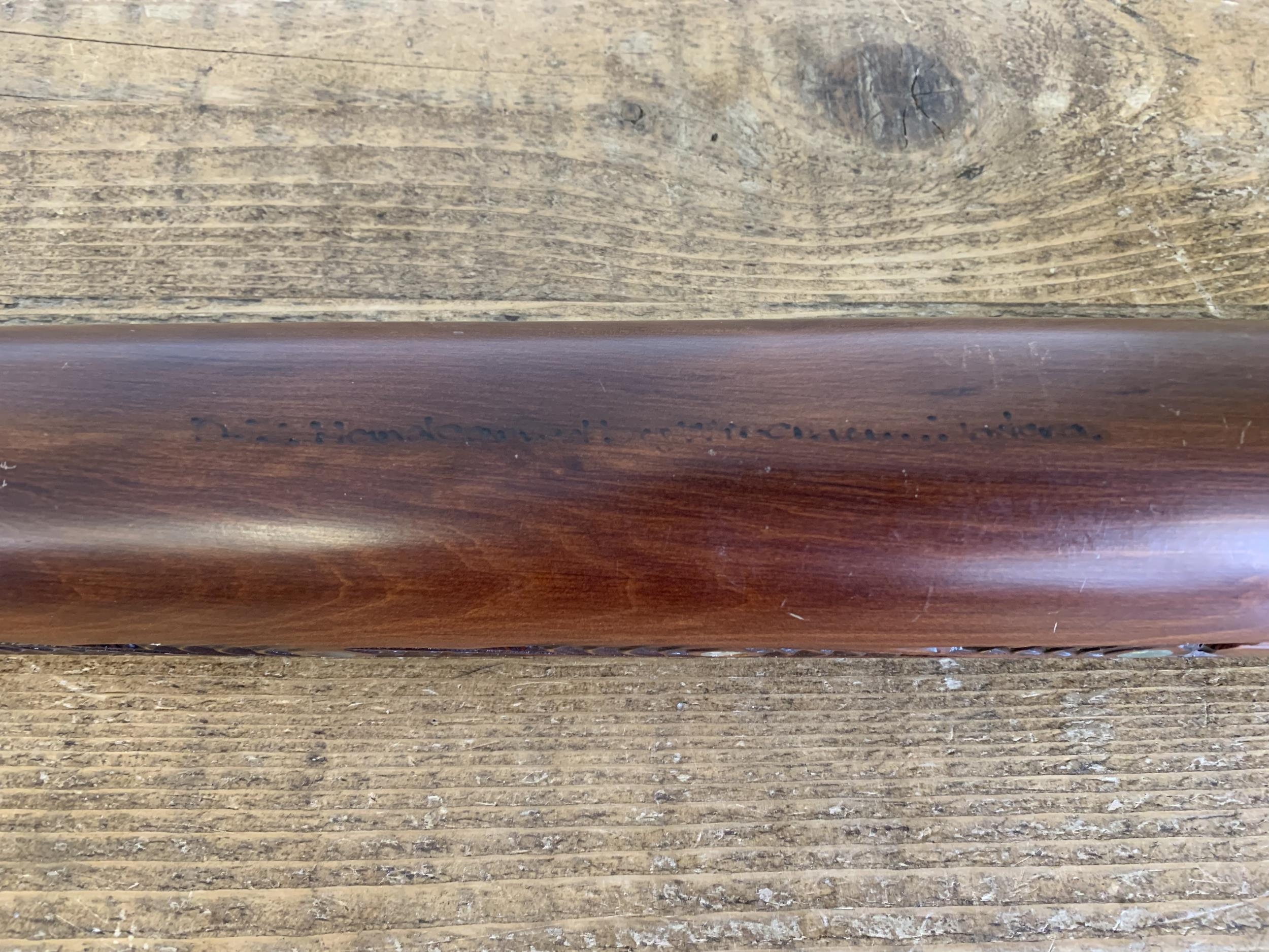 A vintage Maori carved wooden boat, marked 'New Zealand Hand Carved by