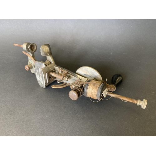 An early 20th Century 'Moldacot' lockstitch pocket sewing machine