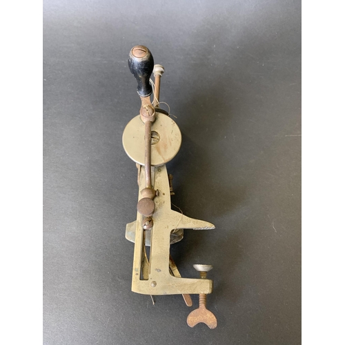 An early 20th Century 'Moldacot' lockstitch pocket sewing machine