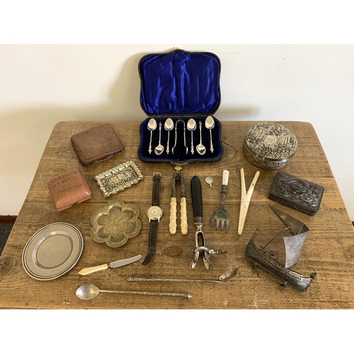 97 - A mixed lot to include a cased set of plated apostle spoons and tongs, white metal boat (as found), ... 