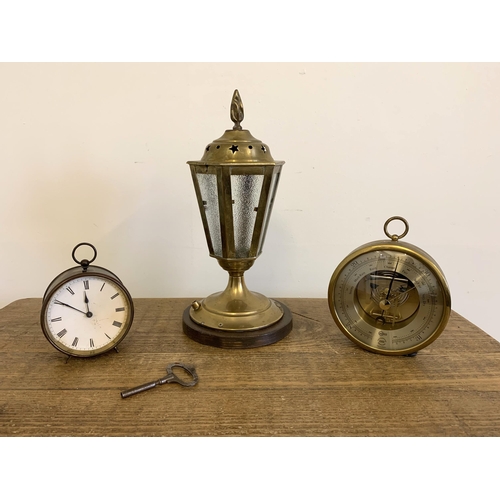 12 - A brass cased vintage key wind clock plus a 'Barigo' twin diaphragm barometer and a brass lantern li... 