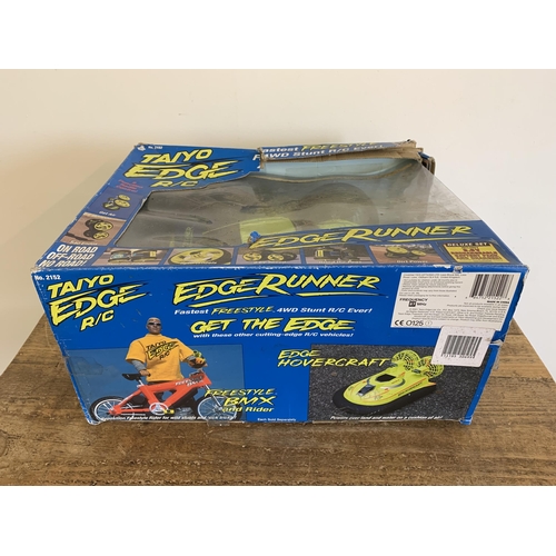 A boxed 'Taiyo Radio Controlled Edge Runner' vehicle (box with storage