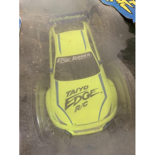 A boxed 'Taiyo Radio Controlled Edge Runner' vehicle (box with storage