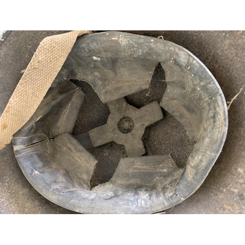 247 - Two WW2 combat Brodie steel helmets, one dated 1939