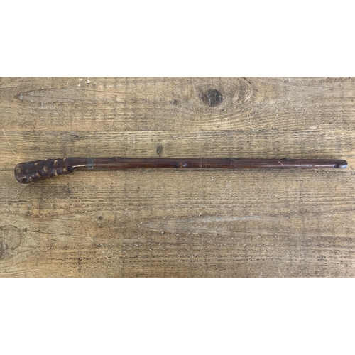 250 - An unusual vintage wooden stick/club, length 23