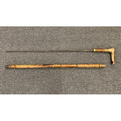 255 - A late 19th Century/early 20th Century wooden swordstick with bone handle and brass collar, length 3... 