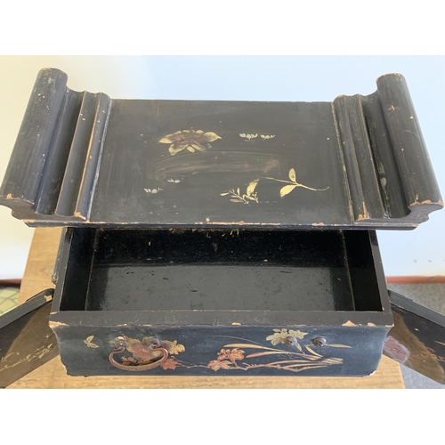 261 - An early 20th Century Oriental black lacquer and hand painted miniature chest/jewellery box with dou... 