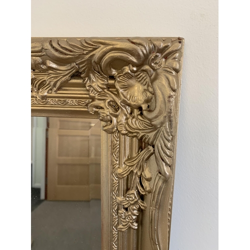 43 - A gilt style bevel edge wall mirror, 32 1/2