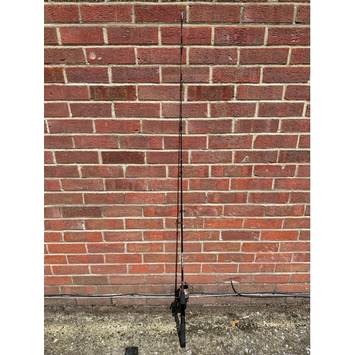 433 - A Shakespeare Ugly Stik 5ft 6 spinning rod with a Shakespeare Targa reel, in a Gardner fishing sleev... 