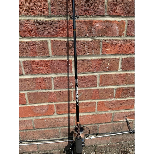 433 - A Shakespeare Ugly Stik 5ft 6 spinning rod with a Shakespeare Targa reel, in a Gardner fishing sleev... 