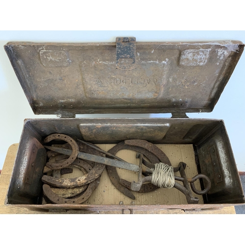 50 - A 1943 dated ammunition tin with vintage horseshoe contents and a smaller ammo tin