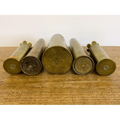 51 - A pair of WW2 era shell cases, 12 1/4