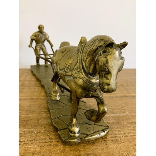 6 - A large and heavy vintage solid brass shire horse with plough, approx. 20