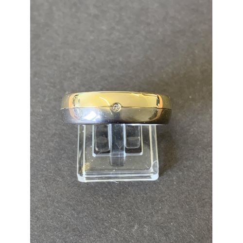 326 - A large 9ct gold and titanium gents ring set with a diamond, approx. size Z, approx. weight 5.9g