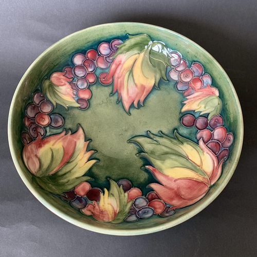 342 - A Moorcroft mid century berry and leaf pattern dish, blue signature to base, 8 1/2