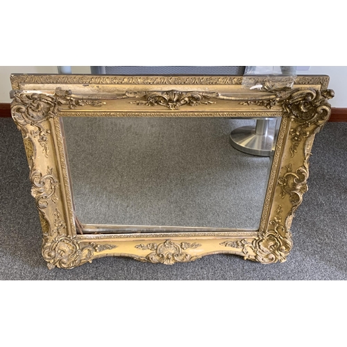 357 - A gilt plaster framed mirror, frame size 30