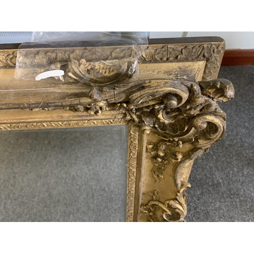 357 - A gilt plaster framed mirror, frame size 30