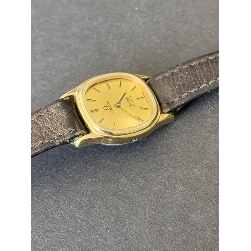 329 - A vintage Omega De-Ville quartz wristwatch (clasp and bezel missing, as found)