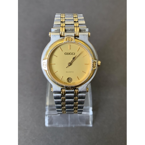 332 - A Gucci gents quartz wristwatch (bezel as found)