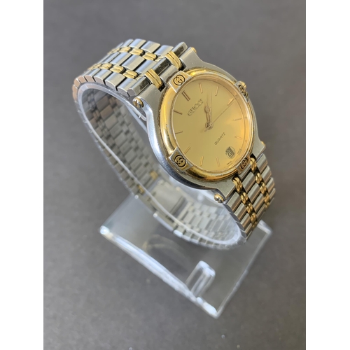 332 - A Gucci gents quartz wristwatch (bezel as found)