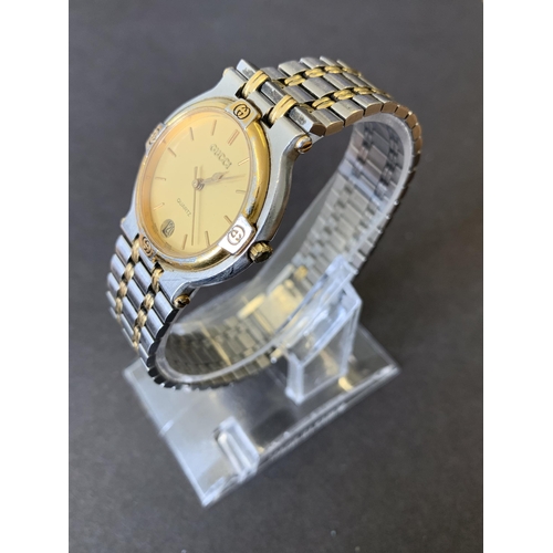 332 - A Gucci gents quartz wristwatch (bezel as found)