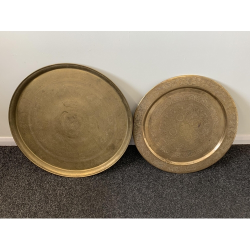 421 - Two Indian style brass trays, the largest 22 1/2