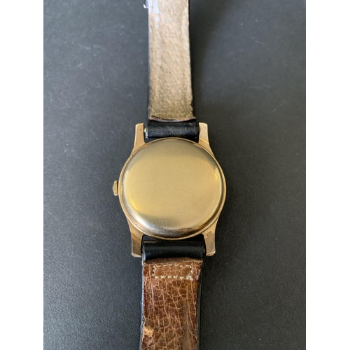 118 - A 1960's 9ct gold Longines wristwatch, comes with it's original guarantee and import paper dated 196... 