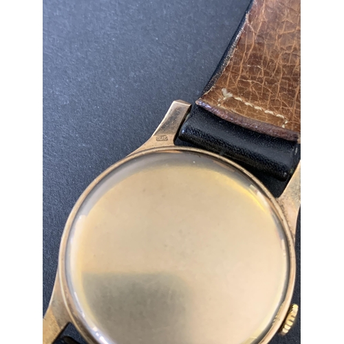 118 - A 1960's 9ct gold Longines wristwatch, comes with it's original guarantee and import paper dated 196... 