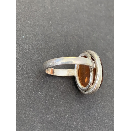 123 - A 925 sterling silver amber set ring, approx. size O 1/2