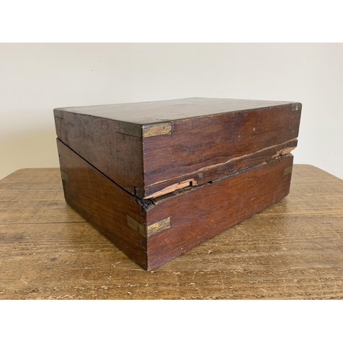 131 - A Victorian rosewood veneered writing slope (for restoration)